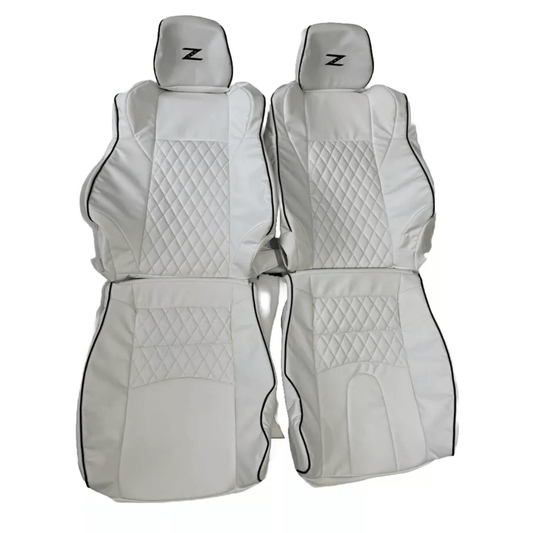 Complete set of Nissan 350Z white leather replacement seat covers with diamond stitching and black piping, crafted for a flawless fit in 2003-2008 models.